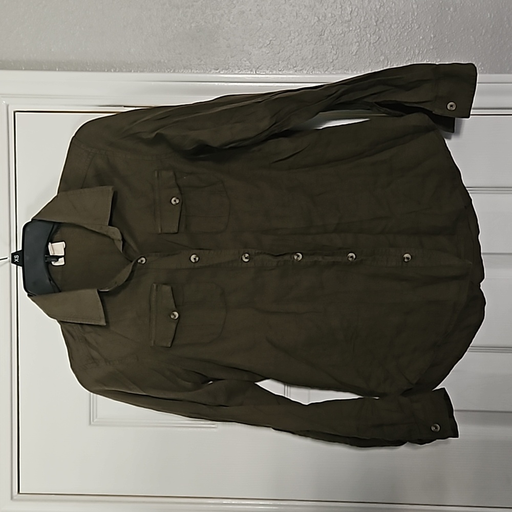 Green button up shirt